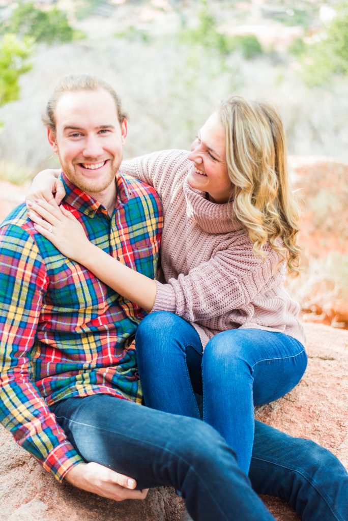 Colorado springs engagement session, Garden of the Gods engagement session, garden of the gods engagement photographer, colorado engagement photographer, colorado mountain engagement session, colorado engagement session, mountain engagement outfits, engagement session outfits, colorado wedding photographer, colorado springs, garden of the gods, mountain engagement, plaid shirt engagement session, pink sweater engagement session